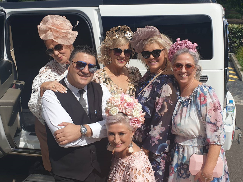 wedding party with limo driver